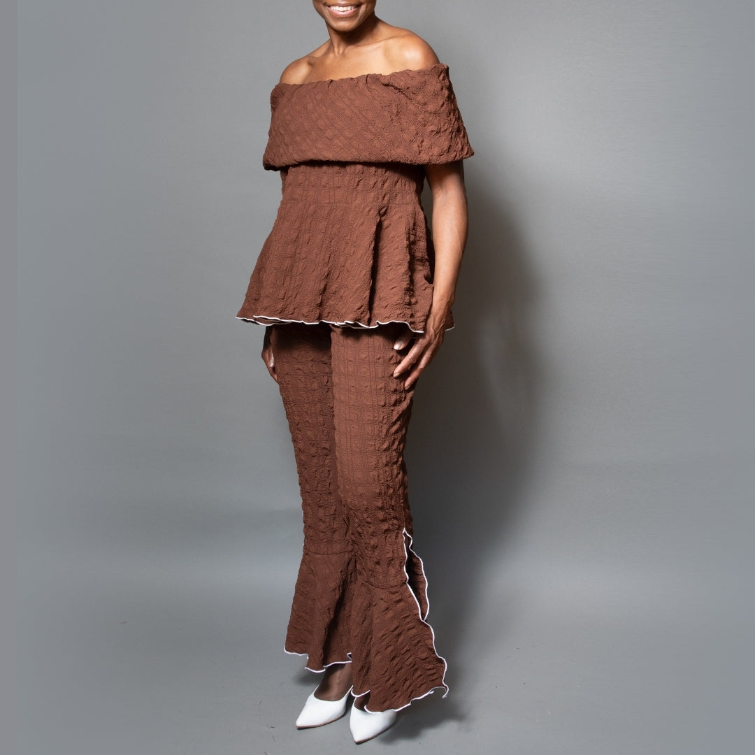 Band shoulder peplum overlock top