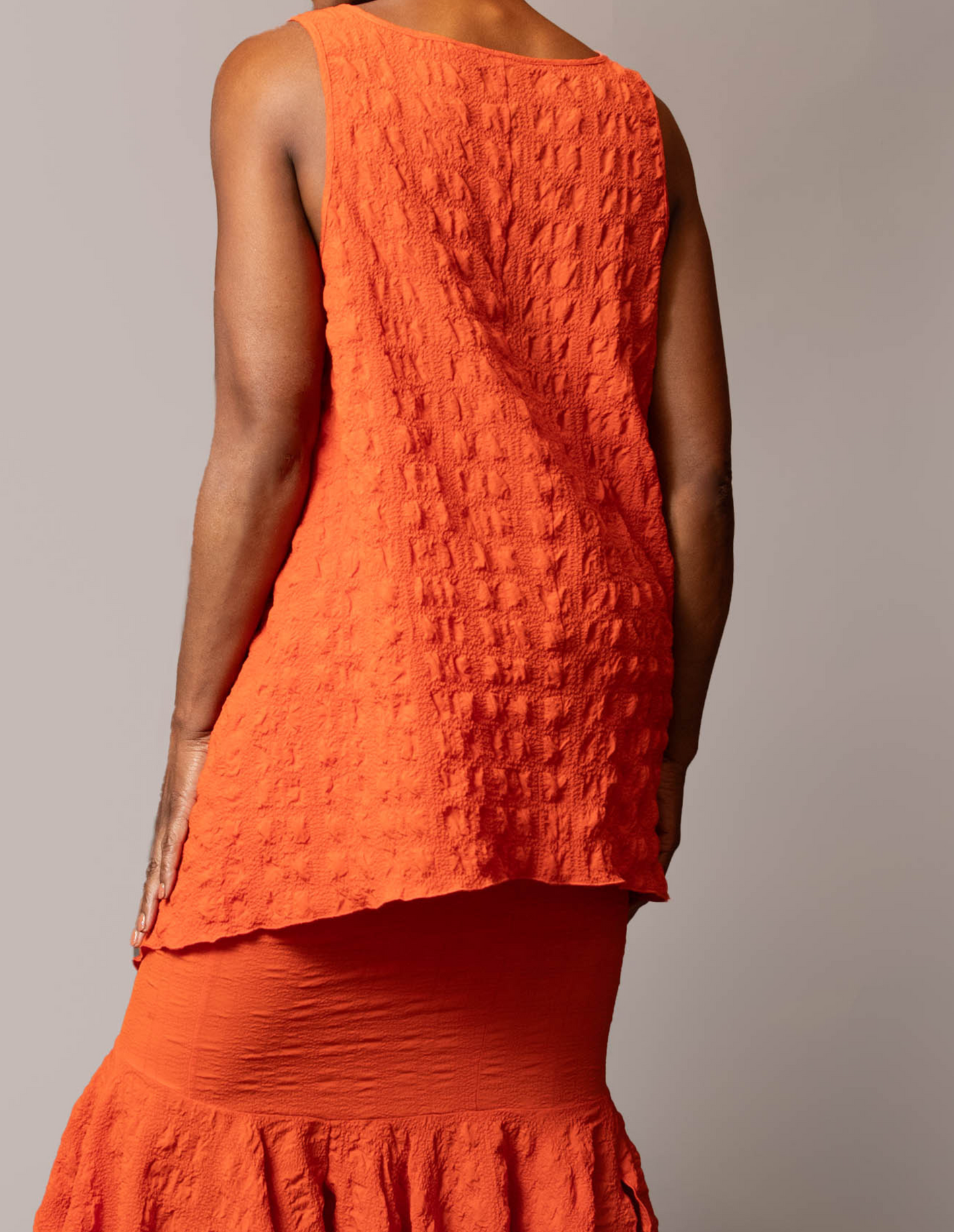 Long sleeveless tunic