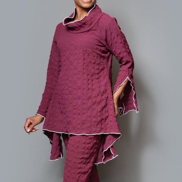 Turtle neck overlock asymmetric hem tunic