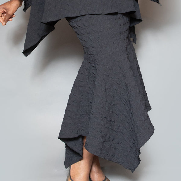 Pull on fit asymmetric hem skirt