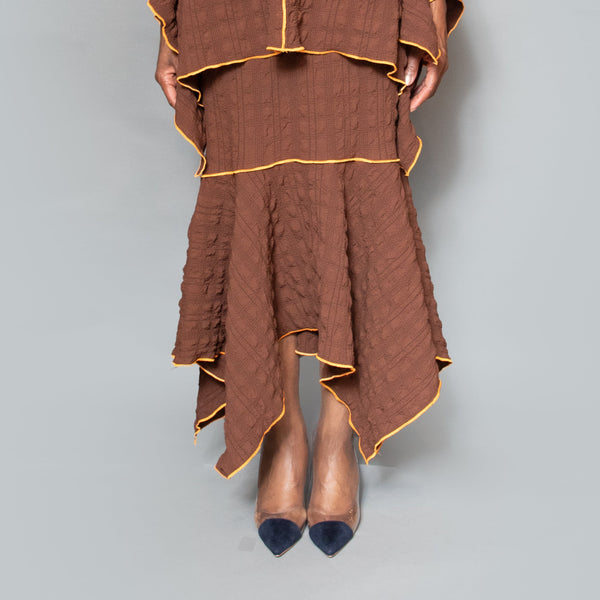 Pull on fit asymmetric hem contrast pearl skirt