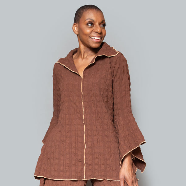 Detailed pearl stitch tunic