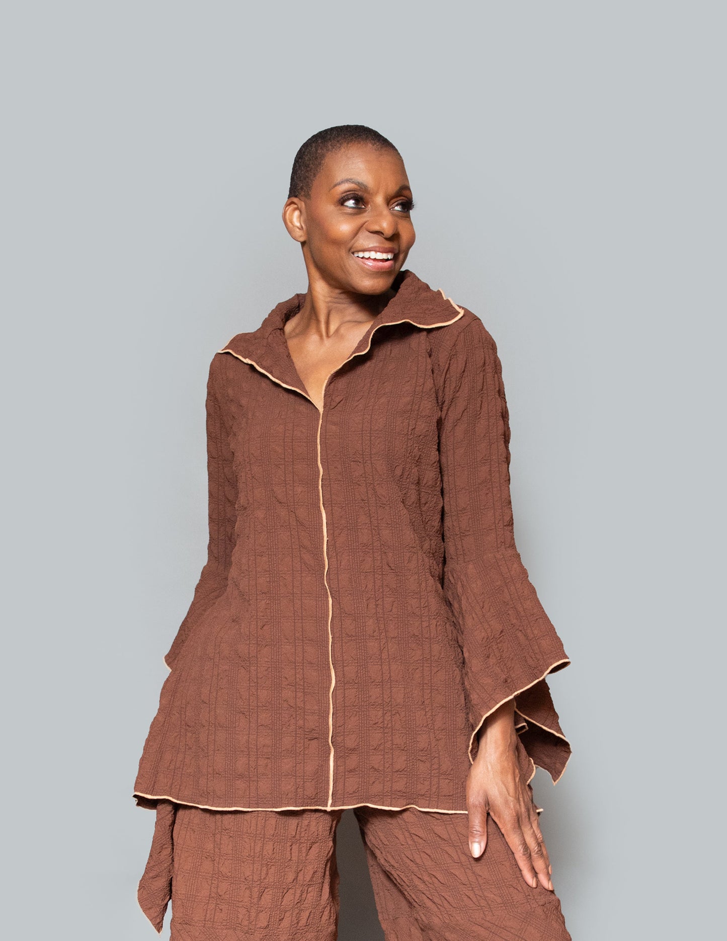 Detailed pearl stitch tunic