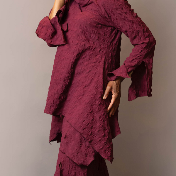 Turtle neck asymmetric hem tunic
