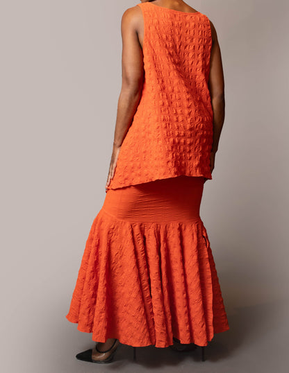 Long sleeveless tunic