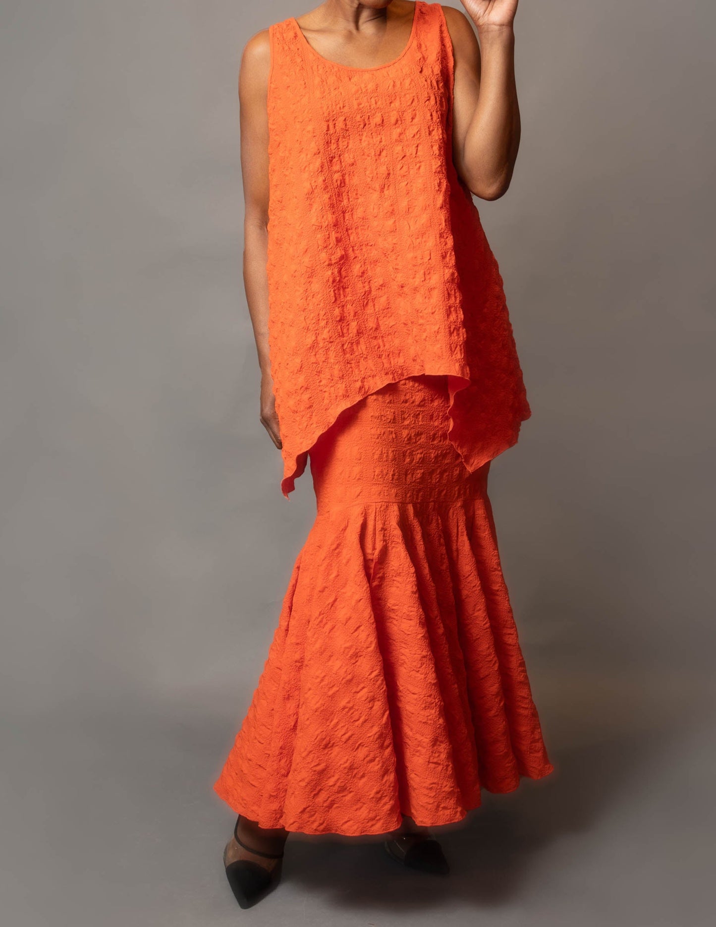 Long sleeveless tunic