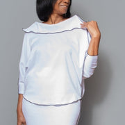 Boat collar dolman sleeve black contrast overlocks knit top