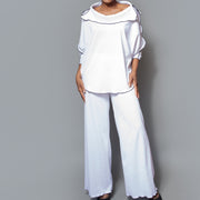 Wide leg black contrast overlocks hem pull-on knit pant