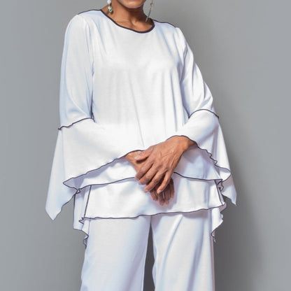 Asymmetric black contrast overlock hem top