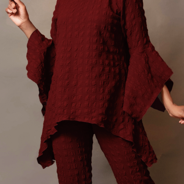 Scoop neck drama hem tunic
